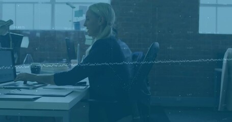 Canvas Print - Working at desk, woman typing on laptop with data processing animation over office scene