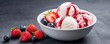 © Kanin - A bowl of strawberry ice cream with a drizzle of marshmallow sauce and fresh berries, photorealistic, hyper-resolution, sweet and fruity indulgence