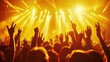 © Bijac - silhouetted concert crowd with raised arms against a backdrop of vibrant yellow stage lights creating a dynamic atmosphere of collective energy