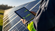 © dK - Close-up of a technician monitoring solar panel performance data on a digital tablet, ensuring optimal energy production in a solar farm