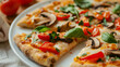 © Volha - A vegan pizza with mushrooms and fresh herbs, Placed on a white plate. Concept Vegan Recipes, Plant-based Cooking, Healthy Eating, Meatless Options. World Vegetarian Day