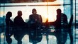 © Jakkarin - A striking silhouette of business people working together, enhanced by network effects, symbolizing teamwork and modern collaboration in a professional setting.