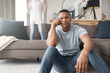 © Lumeez23/peopleimages.com - Burnout, portrait of exhausted father and child on sofa in living room of home for adhd or autism. Energy, noise or stress and unhappy single parent on floor with hyperactive kid in apartment