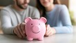 © Design@22 - Couple planning to reach their financial goals faster by increasing savings rates, goal acceleration, financial growth