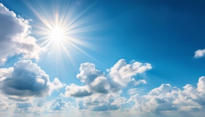 Wall Mural - bright sun shining through fluffy white clouds over clear blue sky in midday