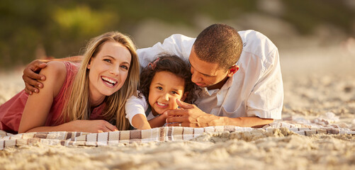 Poster - Portrait, child and parents on beach as happy family for love, support or care on vacation or holiday. Woman, man and interracial in bonding with kid, outdoor and together for affection, joy or relax