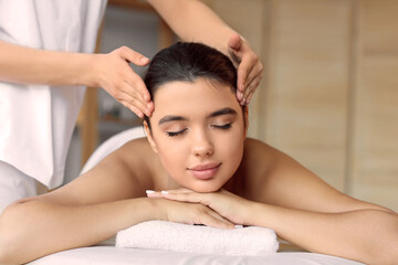 Wall Mural - Beautiful woman receiving spa massage in salon