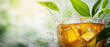 © Nemanja - Ice tea glass banner with green leaf and liquid splash. Copy space, cold refreshing summer drink or beverage, cool juice advertising poster, brand, tasty, leaves, promotion