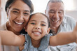 © peopleimages.com - Selfie, happy and portrait of child with grandparents in home for memory, bonding or family time. Smile, love and face of girl kid with grandmother and grandfather for photography picture in house.