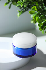 Poster - Stylish presentation of facial cream on white table