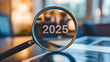 © Nemanja - As we enter 2025, a magnifying glass on business performance and economy trends reveals new year opportunities for startup, focus on vision and strategic analysis for success