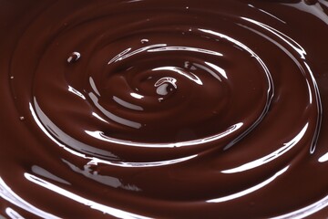 Sticker - Delicious melted chocolate as background, closeup view