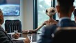 © sablengjago - An alien sits at a conference table with a group of humans. He is looking directly at the camera. The humans are out of focus,