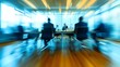 © Stockfish - Blurred style image of businesspeople in a meeting room, creating a focused yet dynamic office environment