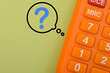 © TeacherPhoto - a calculator juxtaposed with a question mark, symbolizing the uncertainty and confusion often associated with complex calculations or problem-solving.