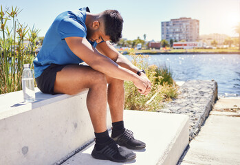 Sticker - Sad, tired runner or man in city on break in outdoor exercise, fitness challenge or running sports. Upset, anxiety or exhausted athlete disappointed by stress, low energy or depression in training