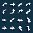 © umut hasanoglu - Collection of various white directional arrows on a dark background.