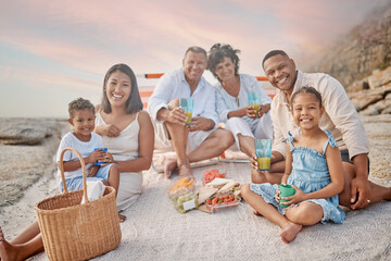 Wall Mural - Happy family, beach and portrait of kids at picnic for holiday, vacation and summer travel. Lunch, food and people by sea with parents, generations and children with juice at celebration to relax