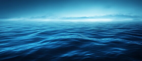 Dark Blue Ocean with Ripples and Distant Fog