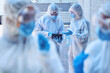 © Azee Jacobs/peopleimages.com - Cleaning, tablet or team of scientists in hazmat or mask virus for sanitation research in outbreak crisis. Technology, teamwork and people outside for healthcare report, covid or pandemic disease