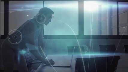 Wall Mural - using laptop in office, businesswoman working with data network animation