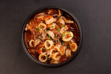 Wall Mural - Calamari Fra Diavolo is Italian Dish, Squid Ring With Spicy Tomato Sauce.