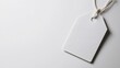 © Ekkarat_Studio - Blank White Tag With String on White Background