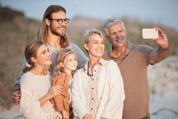 Poster - Beach, selfie and grandparents, parents and child by sea for bonding, relax and travel together in nature. Family, memory and happy mom, dad and girl take picture on holiday, vacation and adventure