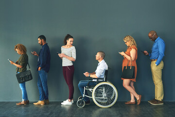 Poster - Hiring, inclusive and job interview with row of people in studio on gray background for opportunity. Diversity, human resources or recruitment and man with disability in wheelchair for equality