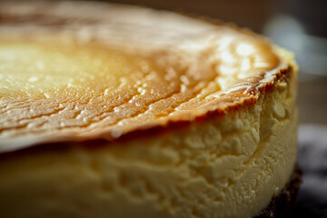 Wall Mural - A close up of a cheesecake with a golden crust