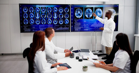 Sticker - Doctors In Clinic Looking At Brain MRI Scan