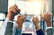 © JordaanExams/peopleimages.com - Business people, hands up and holding in office for diversity, inclusion and acceptance for equal opportunity. Trust, employees and teamwork with solidarity for group, awareness and support for goals