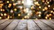 © Thanthara - Christmas card with wood table top and blurred christmas trees with lights copy space