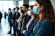 © MOTOKO Stock - Masked Job Seekers in Socially Distanced Queue: Pandemic Era Employment Search for HR and Recruitment