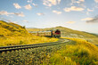 © Husamex - Dogu Ekspresi or Scenic view of the Ankara-Kars Eastern Express train journey through Turkey's landscapes.