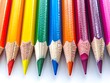 © Bussakon - Vibrant Colored Pencils Arranged on White Background for Creative Projects