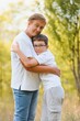 © Serhii - Grandmother walking with her grandson. Relaxing and joying in sunset