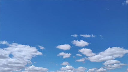 Flattened clouds in the blue sky