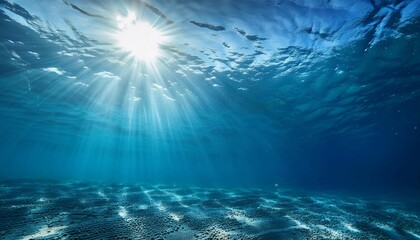 Radiant Sunlight Filtering Through Clear Ocean Water Above a Peaceful Seabed