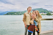 © annanahabed - Outdoor portrait of happy young family of four, travel with children
