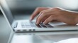 © afridwi - Close-Up of Woman Hands Typing on a Keyboard Laptop.