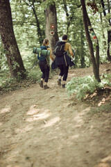 Canvas Print - Two Women Hiking In The Forest