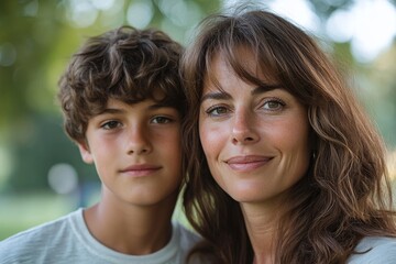 horizontal closeup portrait of a thirty year old woman with her teenage son in a summer park, Generative AI