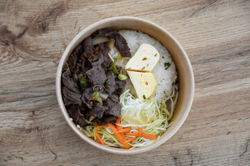 Korean food with beef and egg heart and rice