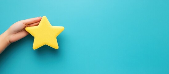 Poster - Yellow Star in a Hand