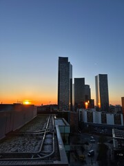 Manchester skyline at sunset with modern buildings and landmarks. Manchester England. 