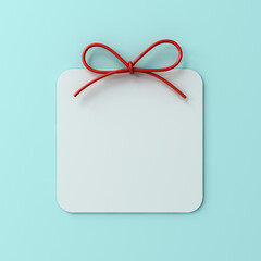 Aufkleber - Blank cute white rounded square sign template or empty white present note card with red gift rope bow isolated on light blue cyan background with shadow minimal concept 3D rendering