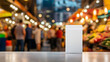 © Maksym Tereshchenko - A white stand-up pouch mockup standing out against a blurred, bustling market background, with people and vibrant stalls blending into an energetic, lively scene.