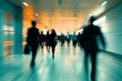 © Irina - Blurry image. background image of a Group of young People walking quickly in a modern building