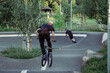 © Edijs - Young man doing tricks on a BMX bike. BMX freestyle against the backdrop of urban landscape. Extreme sports is very popular among youth.